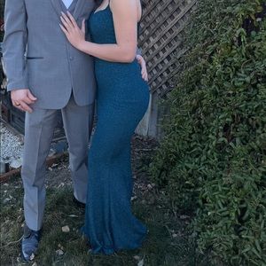 Teal sparkly tight fitting prom dress